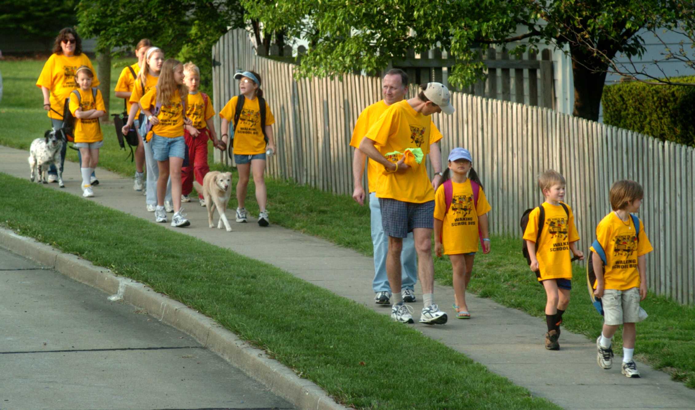 picture of children and parents walking to school 